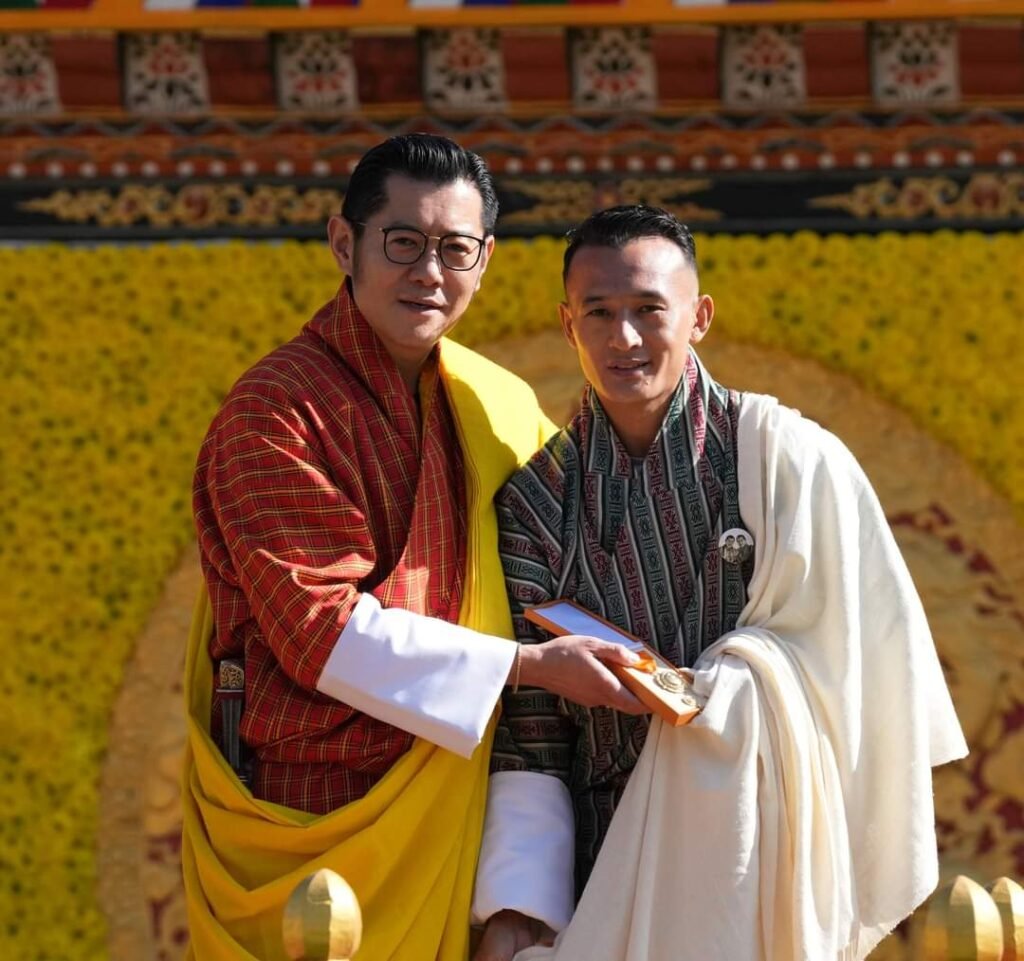 Chencho Gyeltshen receives hold medal from His Majesty
